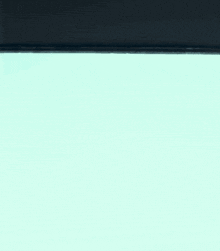 a person is doing a handstand in front of a computer screen