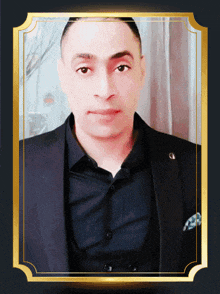 a man in a suit and a black shirt with a gold frame