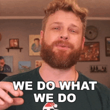 a man with a beard wearing a green shirt that says we do what we do