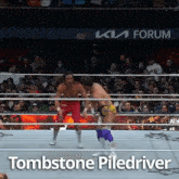 two wrestlers are in a ring with the words tombstone piledriver written on the bottom