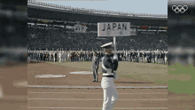 tokyo japan flag bearer marching olympics