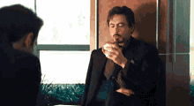 Tony Stark Eating GIF - Tony Stark Eating GIFs