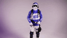 a man in a blue and white uniform has the word nite on his shirt