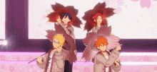a group of anime characters are standing on a stage holding umbrellas in the shape of flowers .