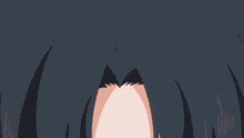 a close up of a person 's eyes with a very angry look on their face