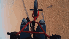a person riding a bike with a handlebar that says bounce