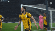 a soccer player with the number 20 on his shirt