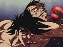 a boxing match with the words who is he on the screen