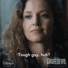 a woman says " tough guy huh " in a daredevil born again advertisement