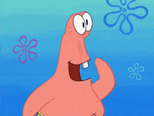 patrick star from spongebob squarepants is smiling with a flower behind him