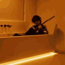 Playing Electrical Guitar In Bathtub Tim Henson GIF - Playing Electrical Guitar In Bathtub Tim Henson Guitar Solo GIFs