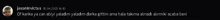 a black background with a blurred image of a person and a few words written in a foreign language