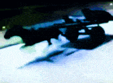 a blurred image of a horse drawn carriage with the word picsart at the bottom right