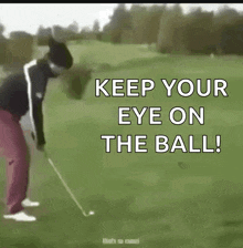 a man playing golf with the words " keep your eye on the ball "