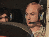 a man wearing headphones looks at something