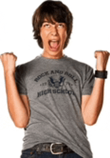 a young man wearing a rock and roll high school shirt
