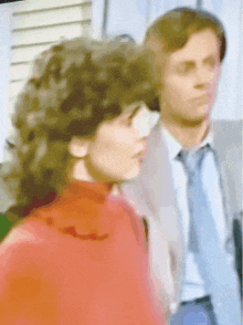 a blurry picture of a man and a woman