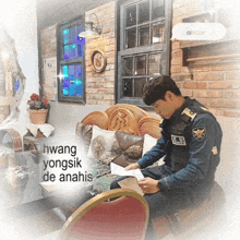 a man in a police uniform is sitting on a couch reading a piece of paper