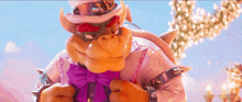 a cartoon character wearing a top hat and a bow tie .
