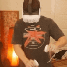 a man wearing a virtual reality headset and a t-shirt that says oculus