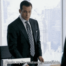 a man in a suit and tie is saying " people say i 'm emotionally unavailable "