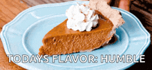 a slice of pumpkin pie with whipped cream on top of it
