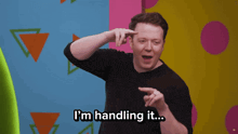 a man says " i 'm handling it " in front of another man