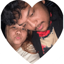 a heart shaped picture of a man and a woman