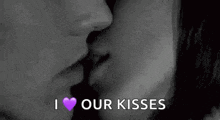 a man and woman are kissing in a black and white photo with the words `` i love our kisses '' .