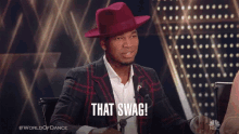 a man in a red hat says " that swag "