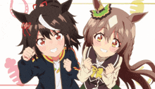 two anime characters are standing next to each other with their fists in the air