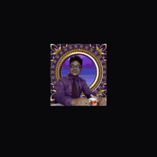 a man in a purple shirt and tie sits in a circle with the words super singing behind him