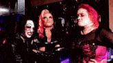 three women are standing next to each other with the word charlatans on the bottom right