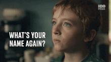 a young boy with red hair is asking what 's your name again .