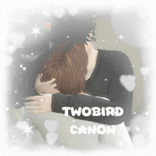 a picture of a man and woman hugging with the words twobird canon on the bottom