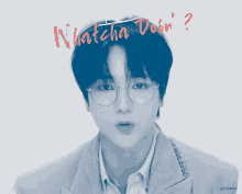 a young man wearing glasses with the words yesung whatcha doin