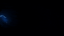 a blue background with a few lines of lightning and a small orange object in the middle