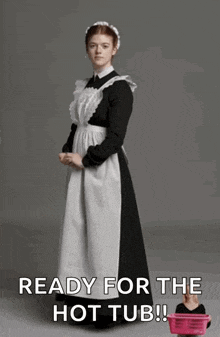 a maid is ready for the hot tub with a pink basket in the background