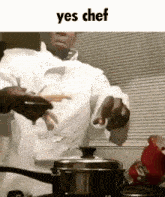 a man in a chef 's coat is cooking in a pot