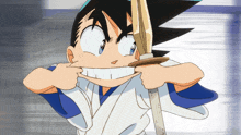 a cartoon character is holding a sword in front of his face