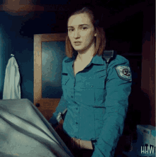 Nicole Haught Top Buttons GIF - Nicole Haught Top Buttons Wynonna Earp GIFs