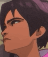 a close up of a cartoon character 's face with a purple headband .