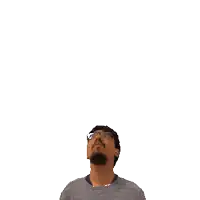 a man with glasses and a beard is looking up at the number 26