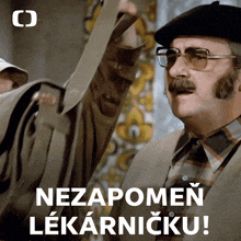 a man with glasses and a mustache is holding a piece of paper with the words nezapomen lekarnicku on it