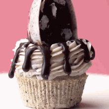 a close up of a cupcake with the words cupcakes on the bottom
