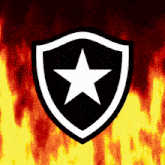 a black shield with a white star in the center is surrounded by flames