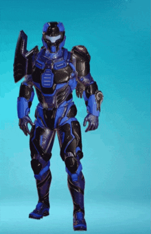 a blue and black robot with a shield and a gun