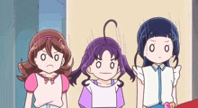 three cartoon girls are standing next to each other and one has a purple hair ponytail