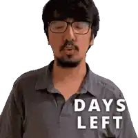 a man wearing glasses and a shirt that says " days left "