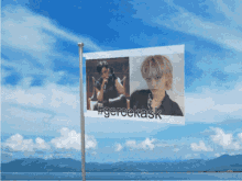 a flag with a picture of a girl and the words #gereekask